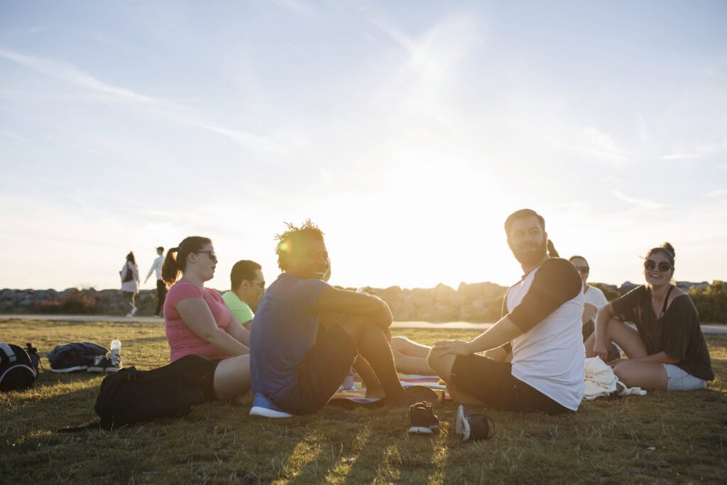 Friends sitting on grass